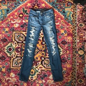 American Eagle distressed mid washed denim